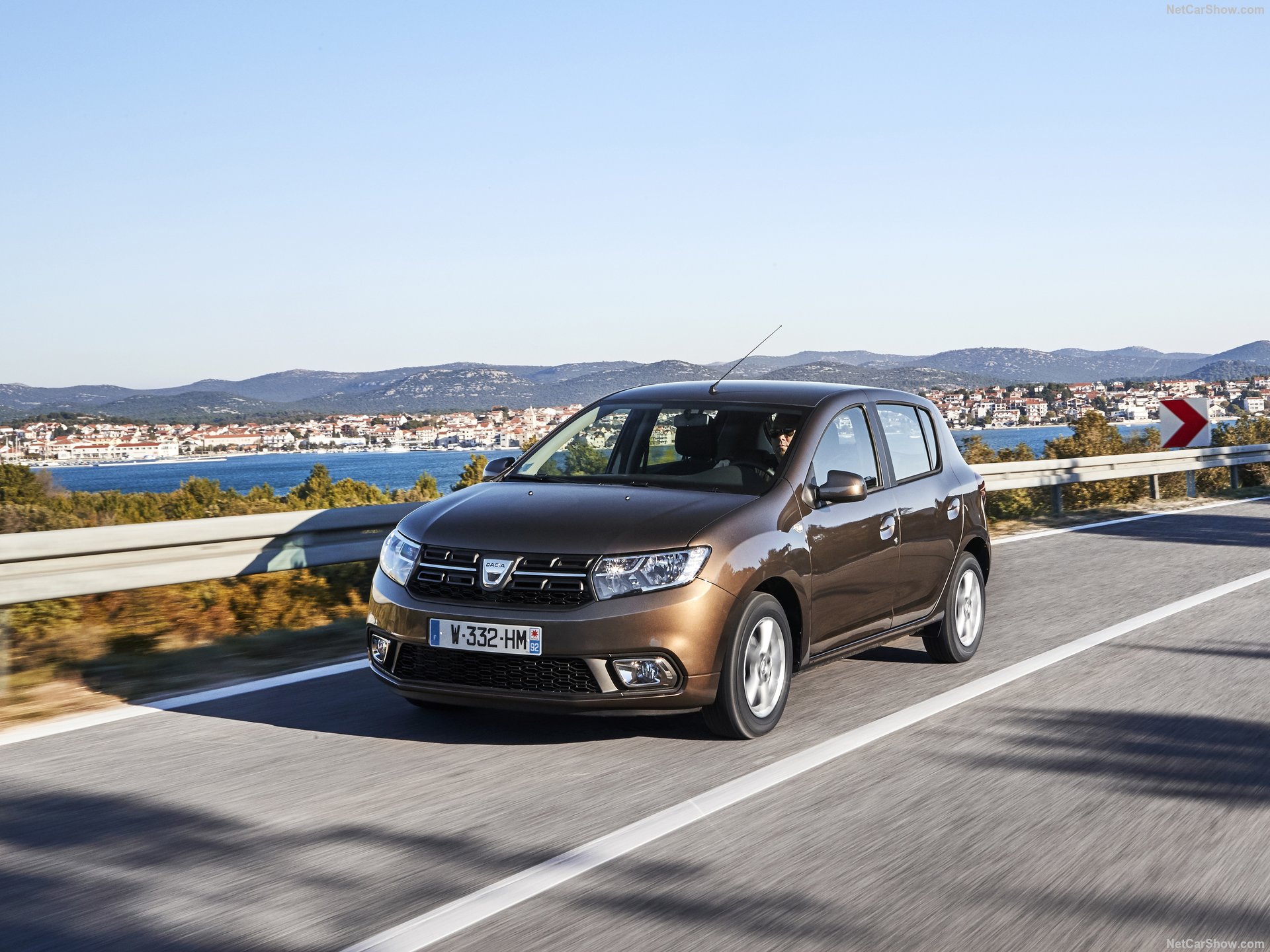 Front view of a 2018 Dacia Sandero parked in Saranda, Albania, available for rent from EasyGo Car Rental.