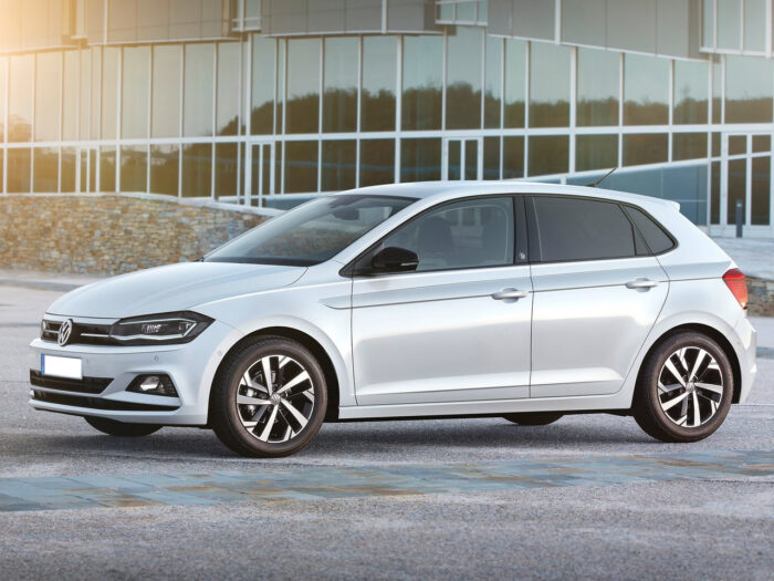 Side view of the Volkswagen Polo petrol automatic rental car parked in Saranda, Albania.